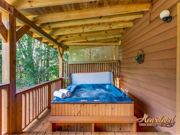 Relaxing hot tub at this 2 bedroom cabin in Pigeon Forge, TN